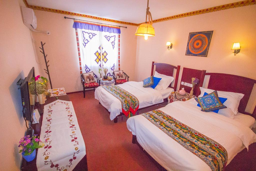 Wo Home Hostel Jiuzhaigou Buitenkant foto