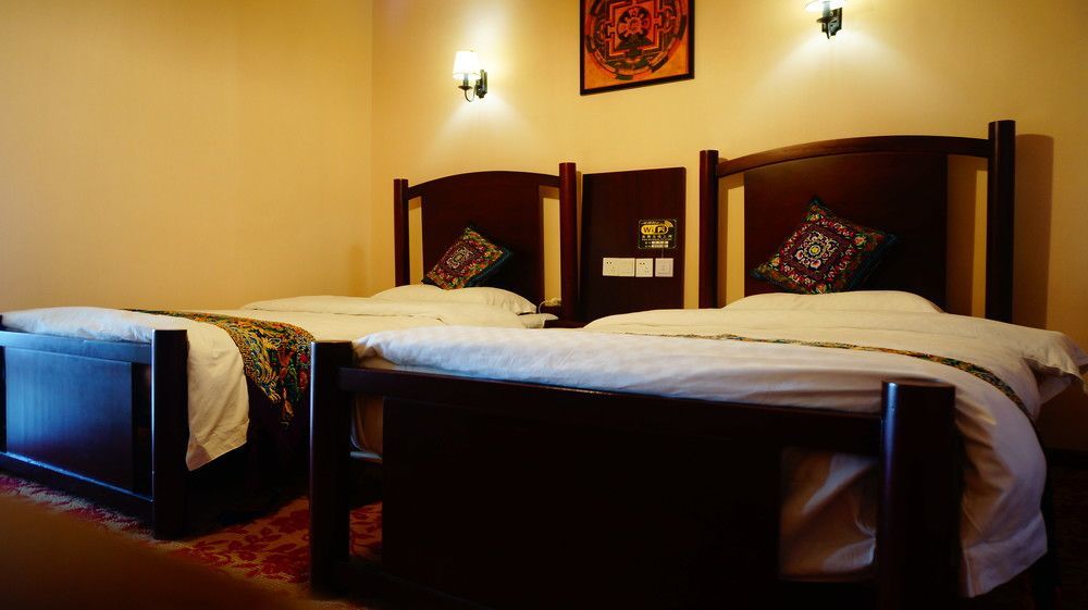 Wo Home Hostel Jiuzhaigou Buitenkant foto
