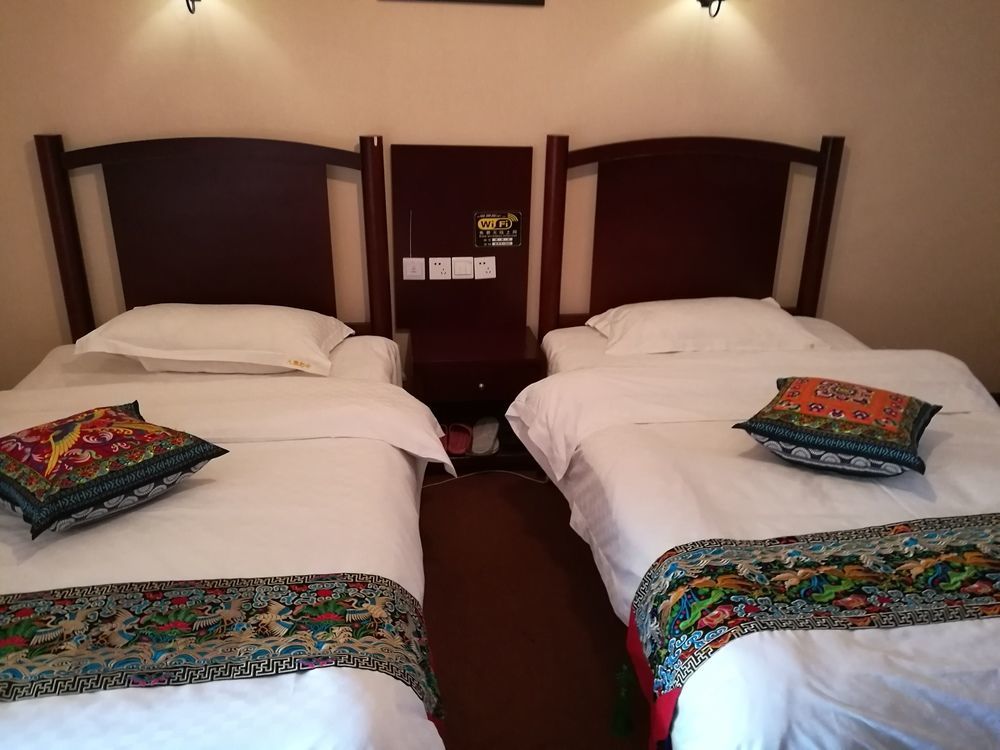 Wo Home Hostel Jiuzhaigou Buitenkant foto