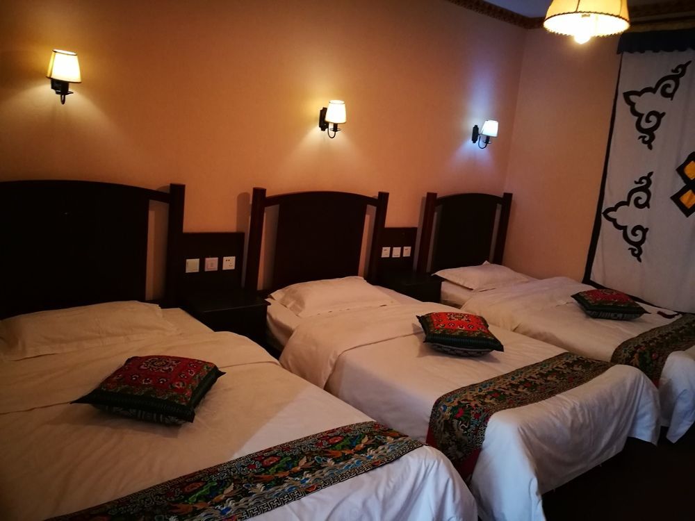 Wo Home Hostel Jiuzhaigou Buitenkant foto