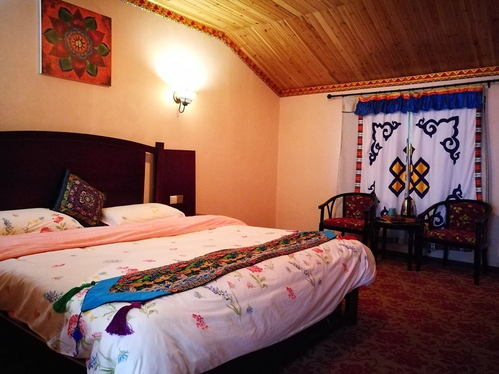 Wo Home Hostel Jiuzhaigou Buitenkant foto